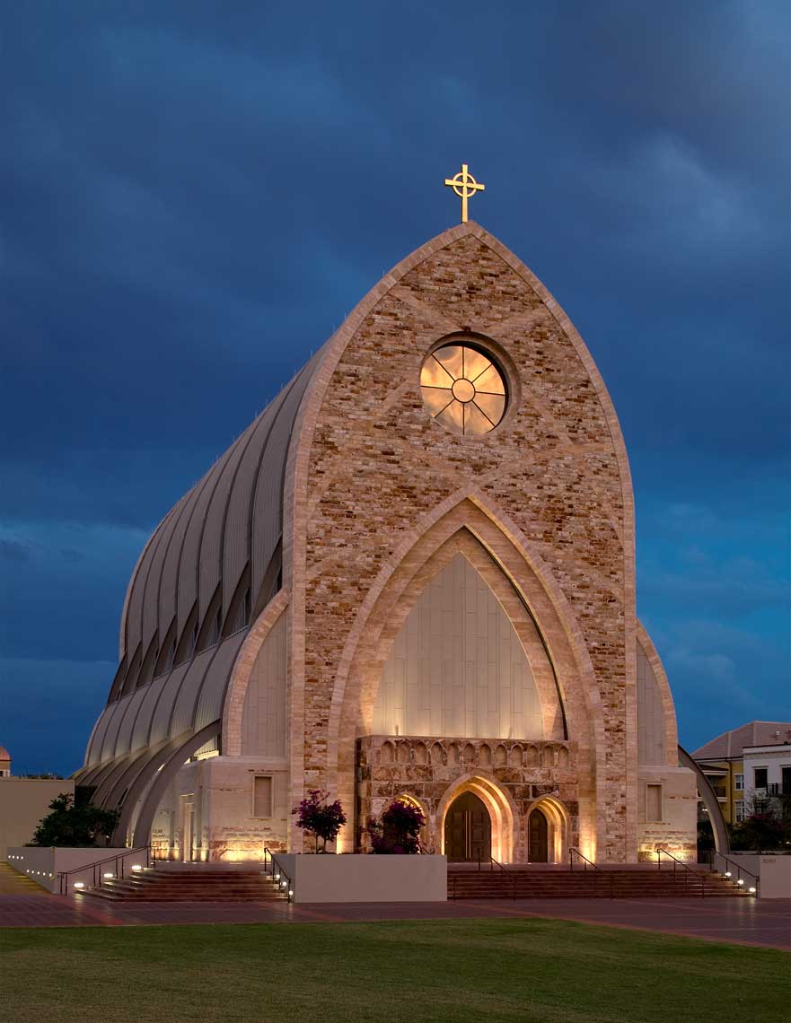 A twilight view showing the Oratory at the Ave Maria University in Naples, Florida