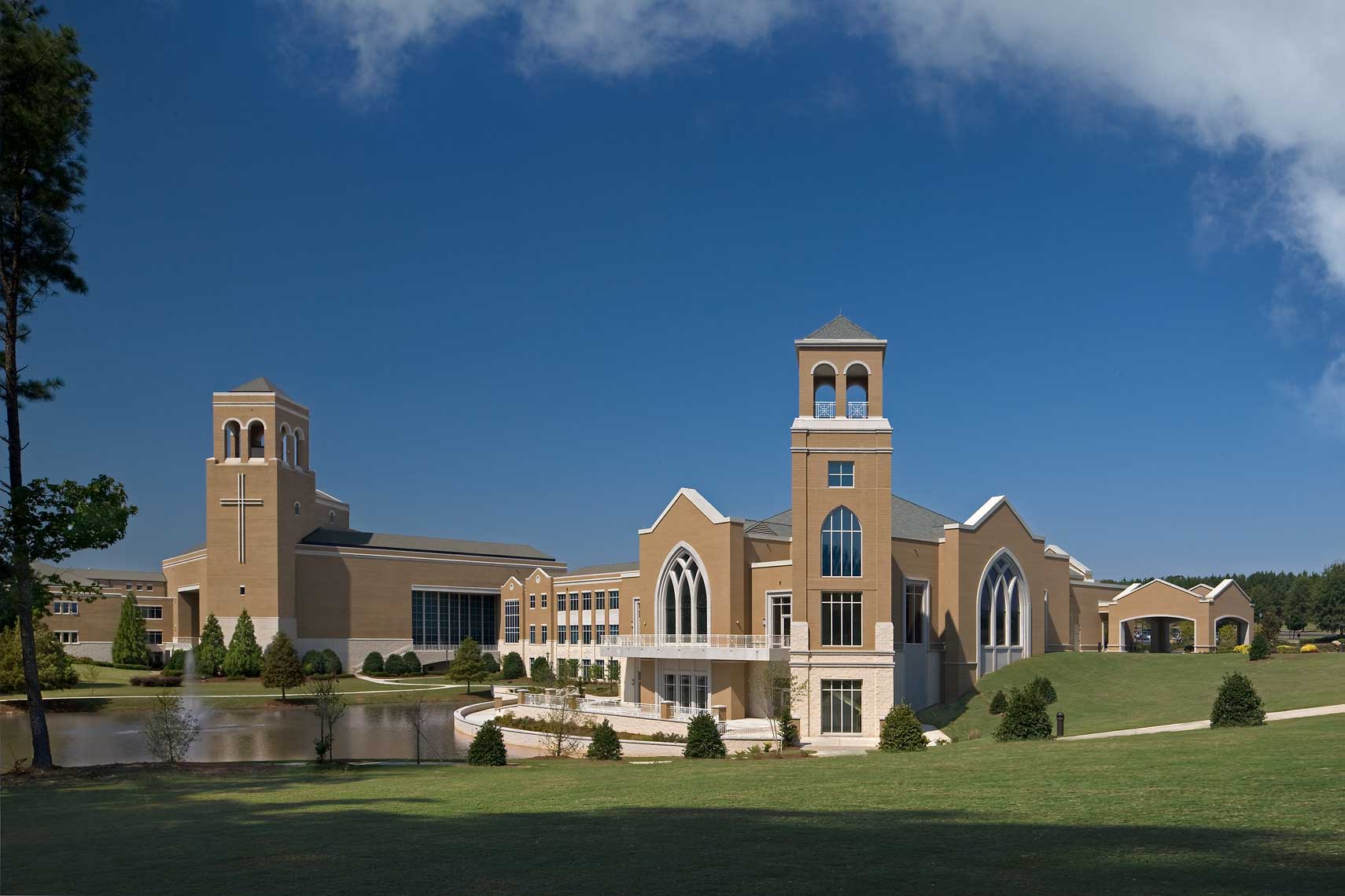 A daytime exterior view of the Cecil B. Day Chapel at Perimeter Church and surrounding landscape