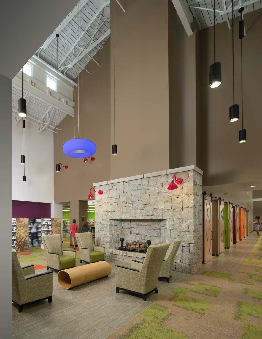 An intriguing view of the lobby fireplace within the Milton Branch Library in Milton, Georgia