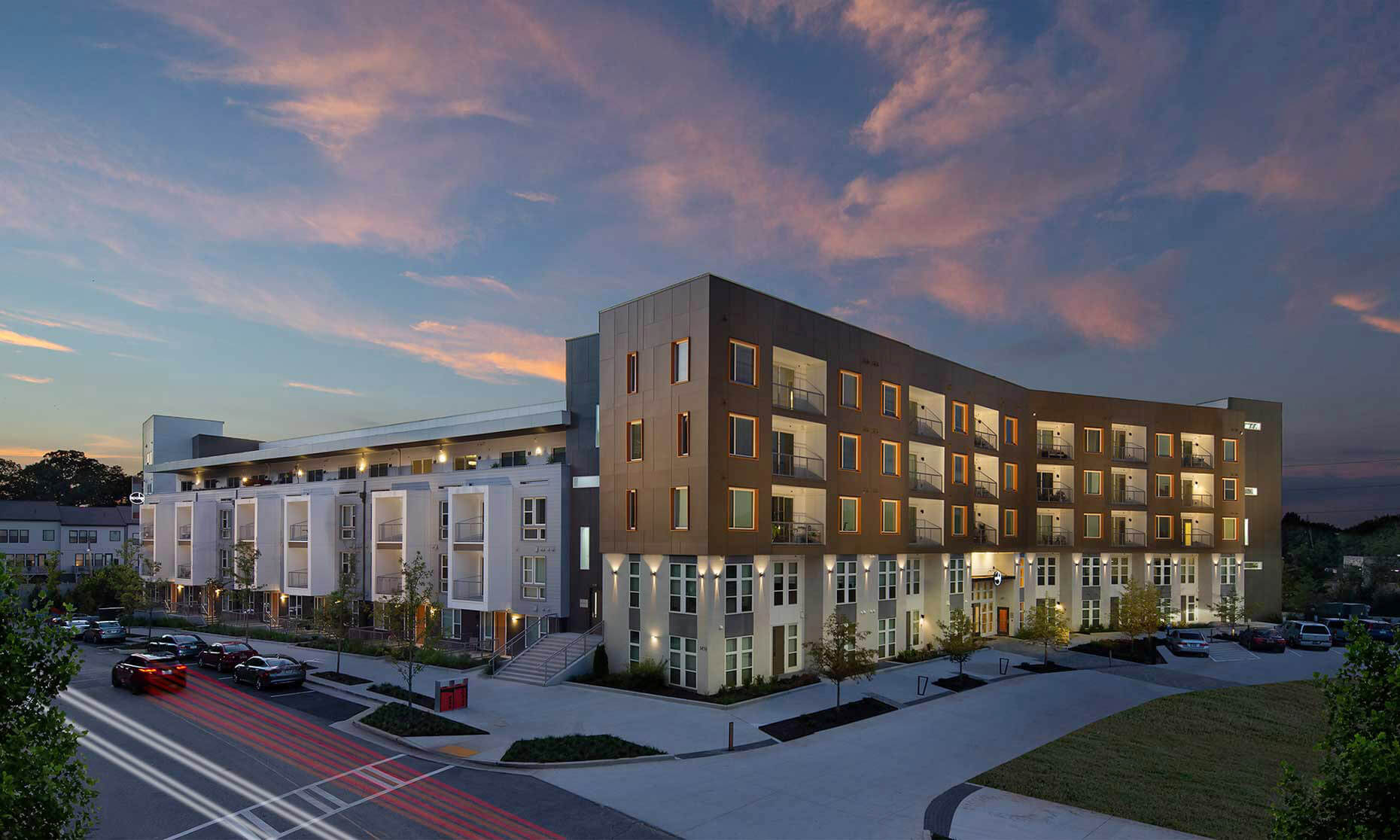 An elevated view at twilight of the Spoke at Edgewood-Candler Apartment Community