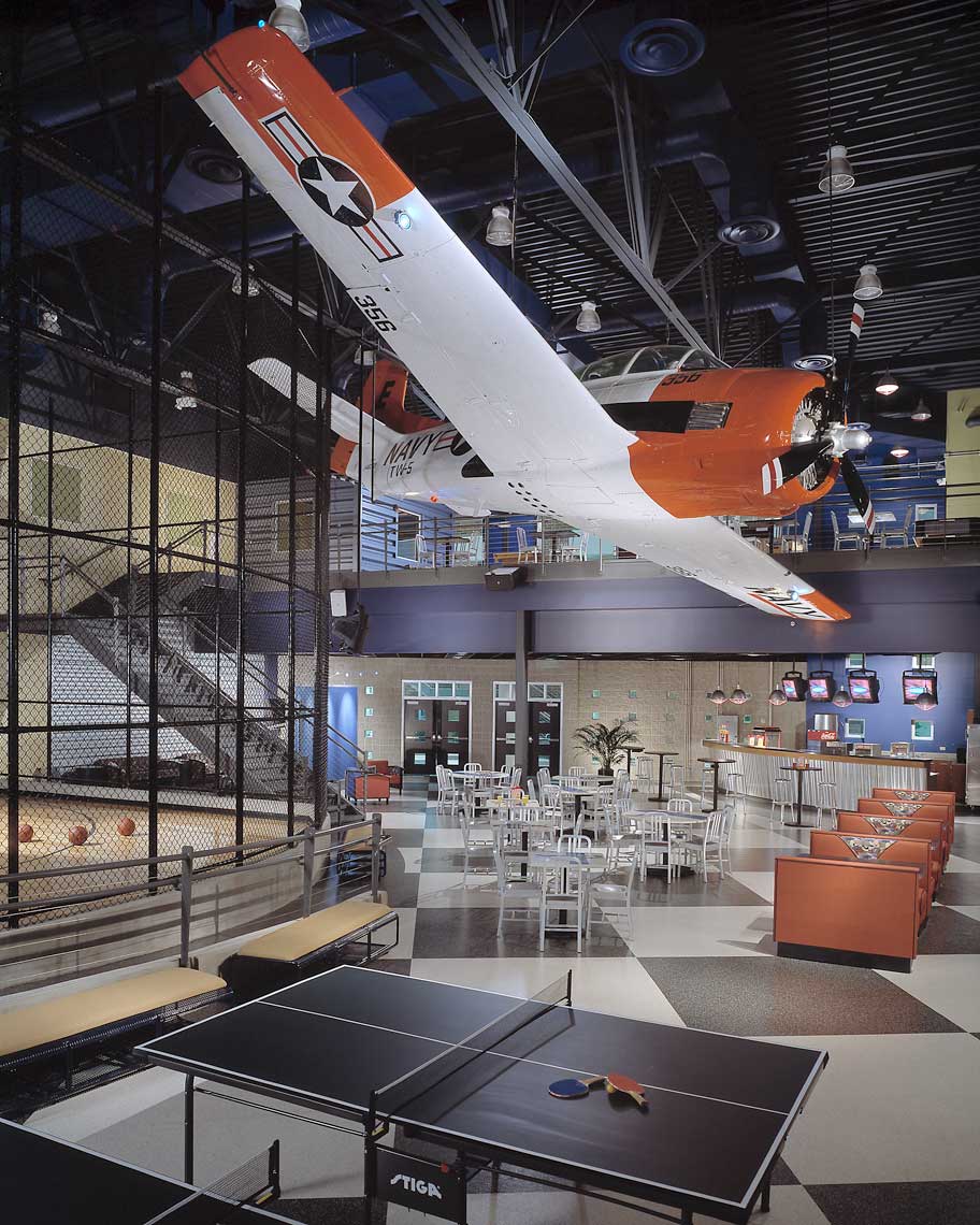 A fun-filled photo of the Rec Room, complete with an airplane hanging from the ceiling, at First Baptist Church in Spartanburg, SC