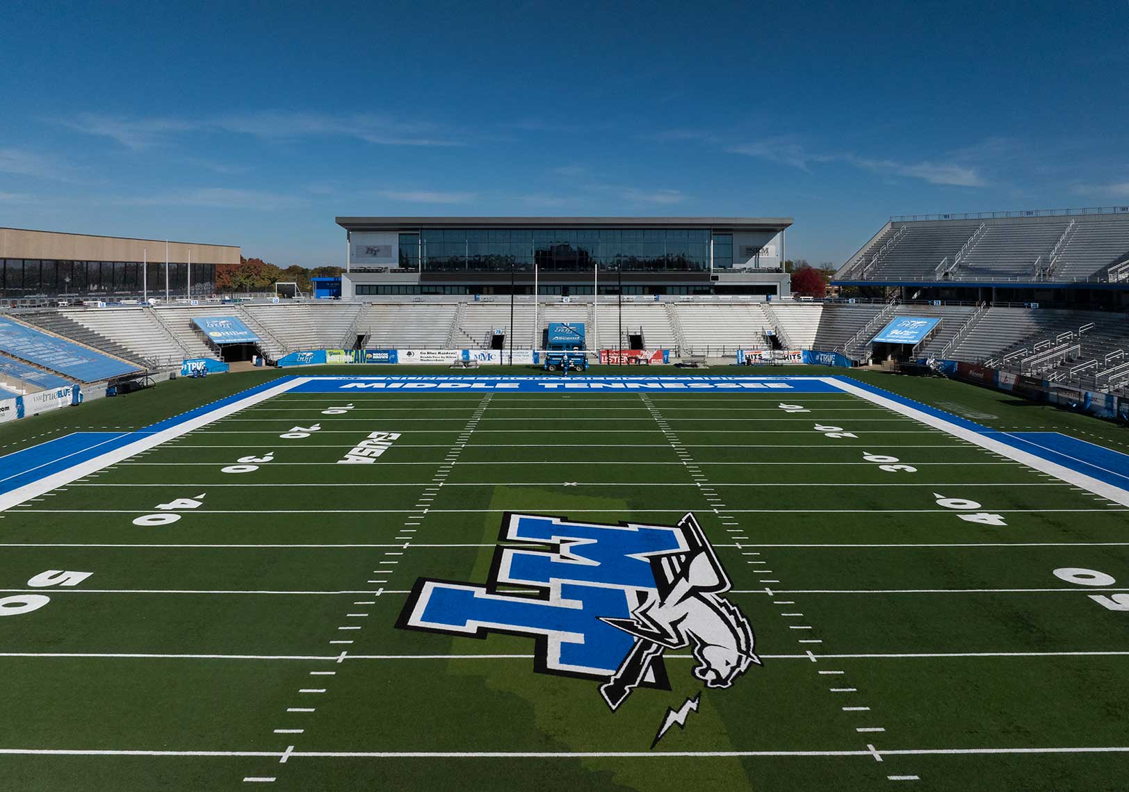 An elevated view of the Middle Tennessee State University Student-Athlete Performance Center looking over the football field and the athletic logo