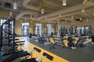 The strength & conditioning center at Panther Stadium at Birmingham-Southern College featuring cardio and weightlifting equipment