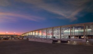 Exterior twilight view of the terminal and concourse at the MSY North Terminal - Atlanta Architectural Photographers