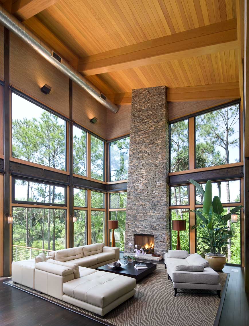 Interior view of a clerestory living room and fireplace at a Kiawah Island Residence