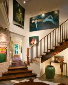 Interior view of the staircase and art at a Spring Island Residence