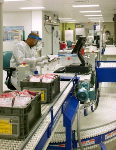 A view of technicians processing donated blood at the American Red Cross Blood Center