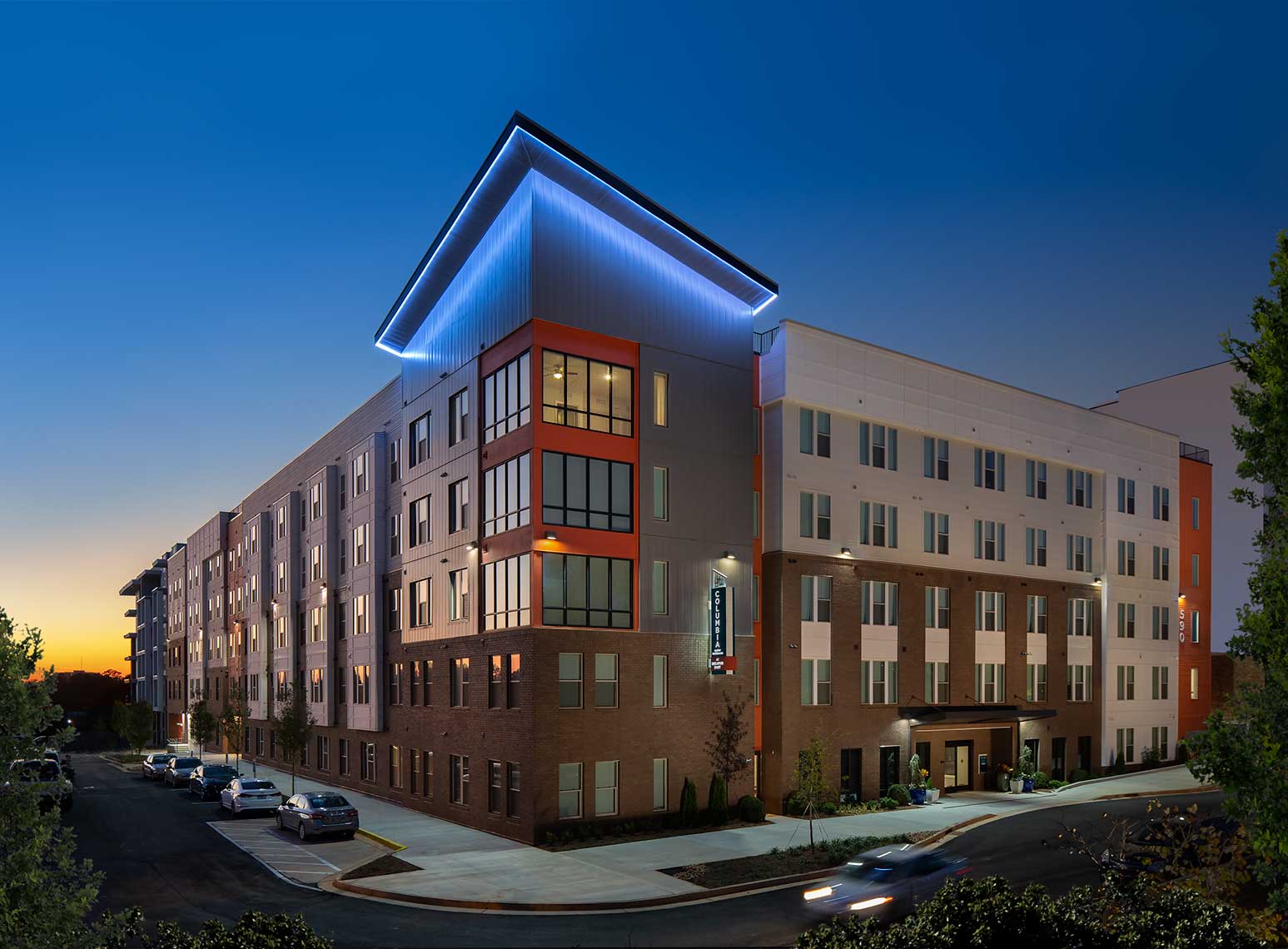 A twilight view showing the bold architecture and lighting at Columbia Senior Residences Avondale
