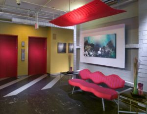 A view of the fun and colorful elevator lobby at the Columbia Tower at MLK Village