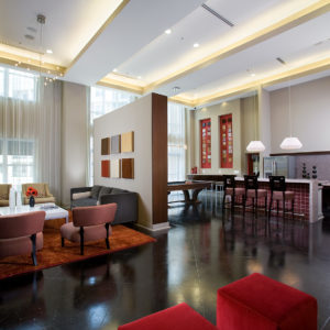 An interior view of the nicely appointed and welcoming Social Lounge at Goodwynn at Town Brookhaven