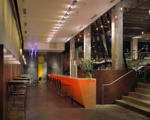An interesting photo of entry and two-story space within the Halo Bar in downtown Atlanta