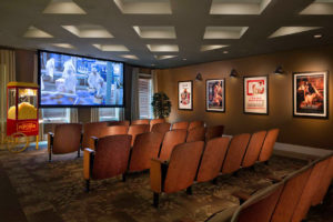 A photo of the inviting and comfortable clubhouse theater at Heritage Senior Residences at Columbia Parc