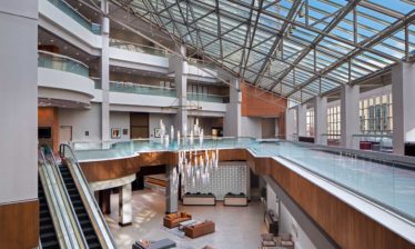 A powerful view of the expansive lobby at the Hyatt Regency Cincinnati