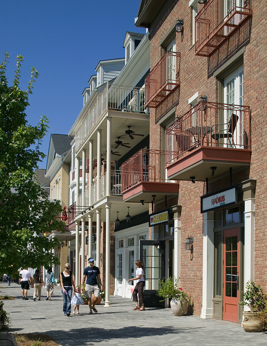 Shoppers enjoy the retail options and the architectural balconies at Ivy Walk in Vinings, Georgia
