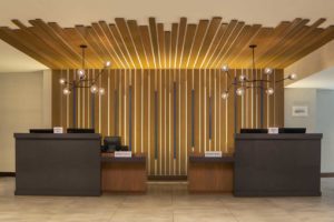 A head-on view of the striking front desk at the Marriott Atlanta Perimeter Center