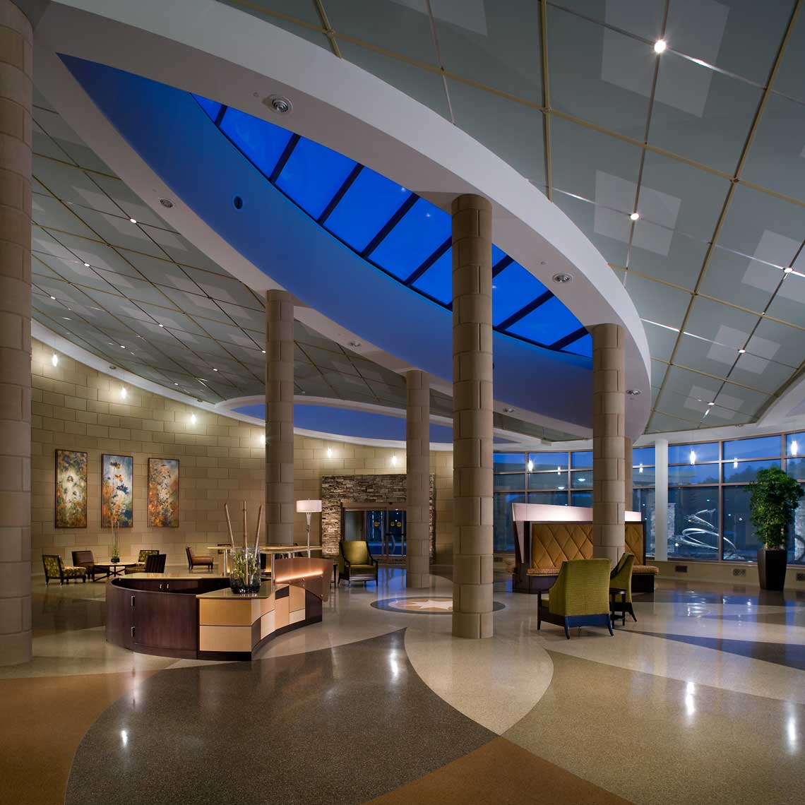 Twilight offers a stunning time to photograph the lobby of the Northside Forsyth Womens Center