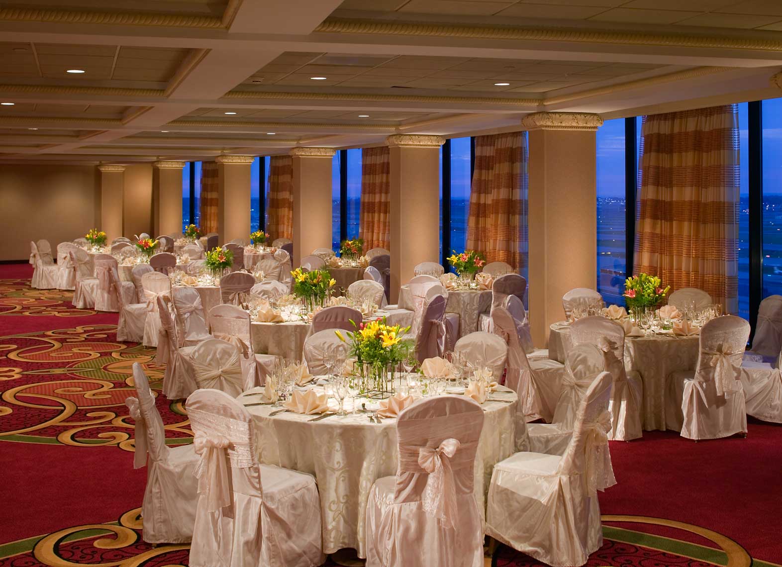 A view of the ballroom at the Renaissance Hotel St. Louis Airport with formal reception seating
