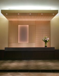 A striking interior view of the reception desk at The Heldrich in New Brunswick, New Jersey