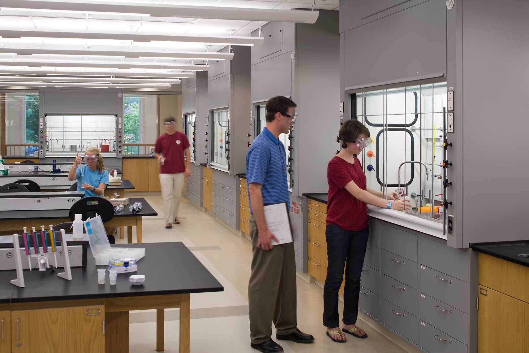 A photo of faculty and students in the Chemistry Lab at the University of the South