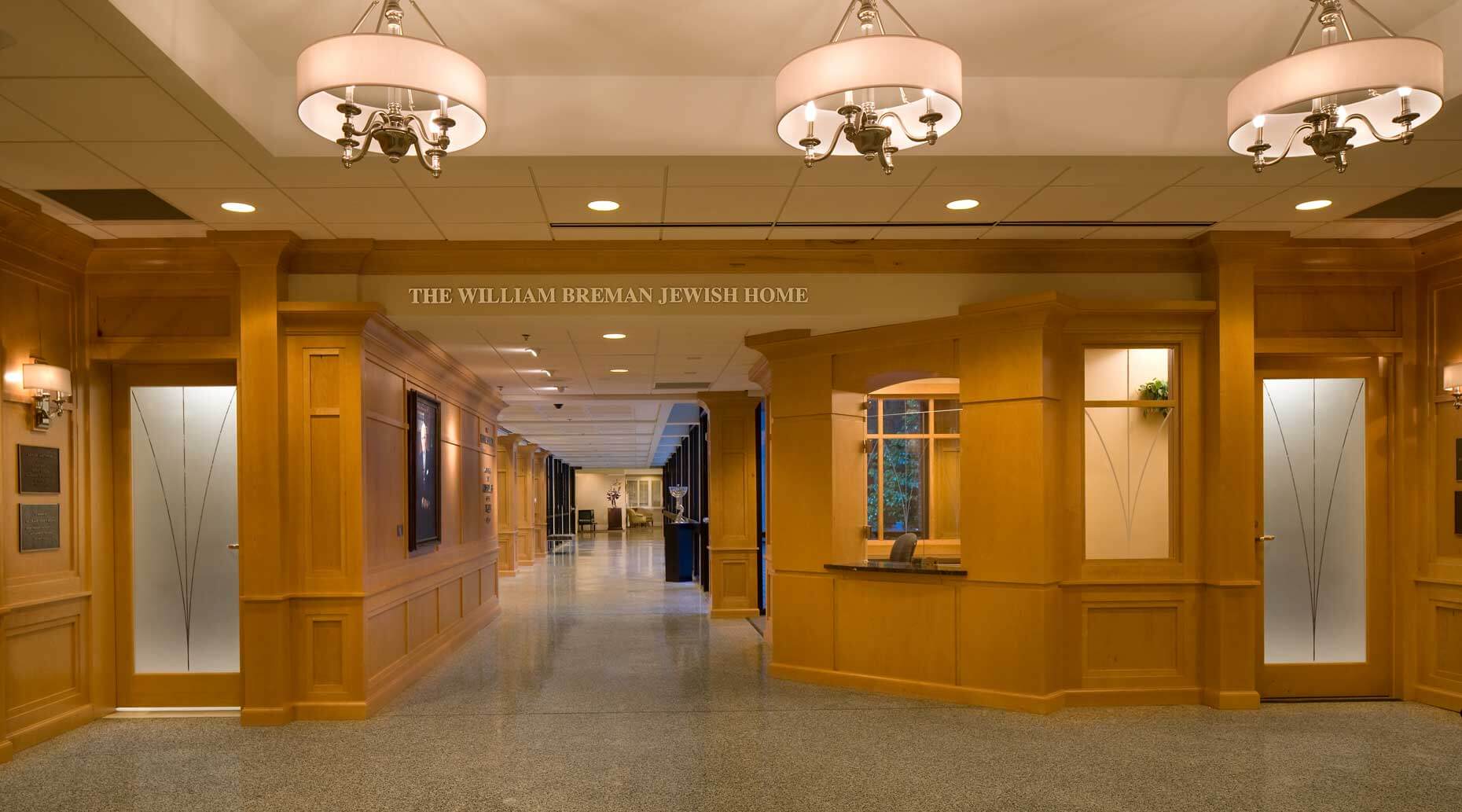 A comprehensive view of the entry, millwork, and hallway at the William Breman Jewish Home