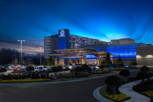 A dramatic twilight exterior portrait of the Wind Creek Hotel and Casino in Montgomery, AL