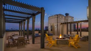 A twilight view of the inviting rooftop lounge at Elle of Buckhead - Atlanta Architectural Photographers