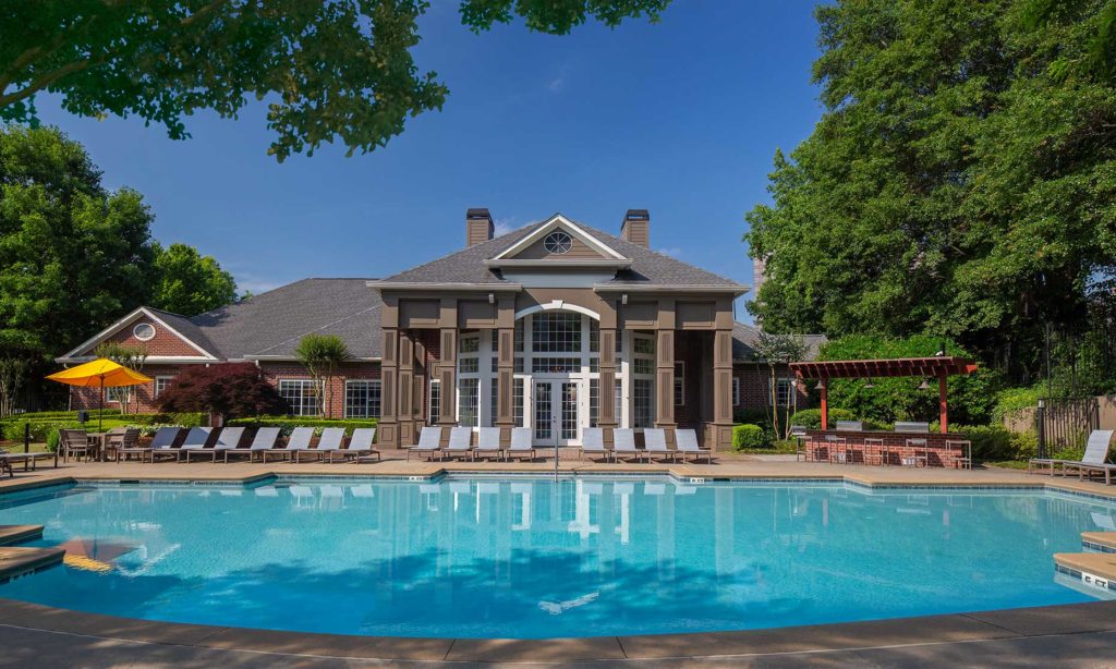 A lovely photo of the pool and leasing center at Flats at Mt. Vernon - Atlanta Architectural Photographers