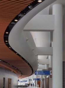 A view of the curved ceiling forms on the concourses at MSY Airport