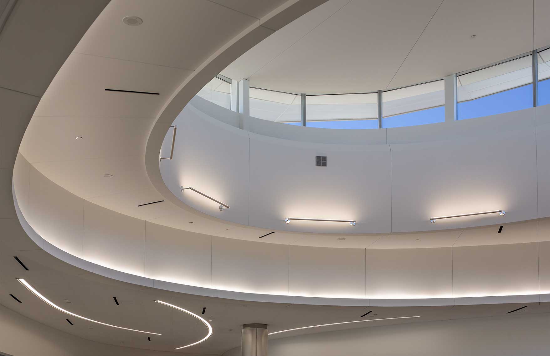 A daytime photograph of the oculus and lighting within the Concourse T North Expansion at Hartsfield Jackson Atlanta International Airport, providing a sense of openness and space.