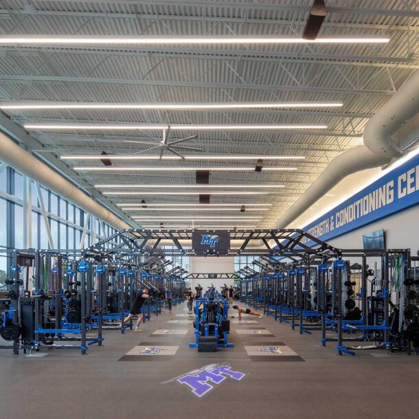 A comprehensive interior view of the MTSU athlete weight room being utilized by student athletes