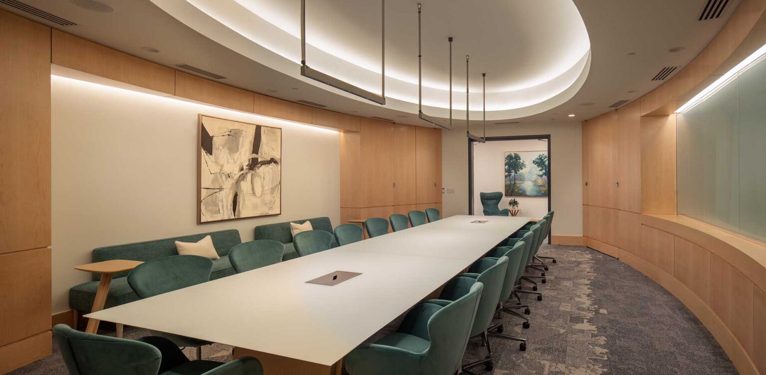 A view of the spacious conference room in the Hyundai Mobility Training Center of Georgia emphasizing the generous seating and comfortable surrounds