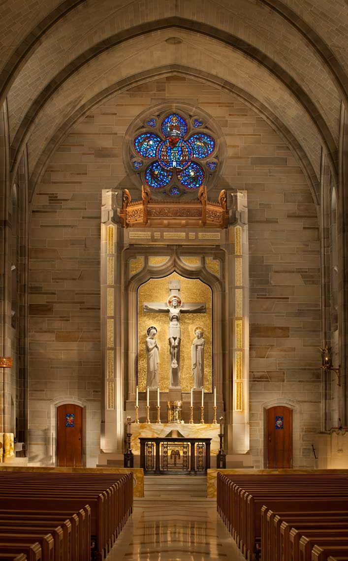 A head-on photograph of the altar of Cathedral of Christ the King, featuring the Rose Window