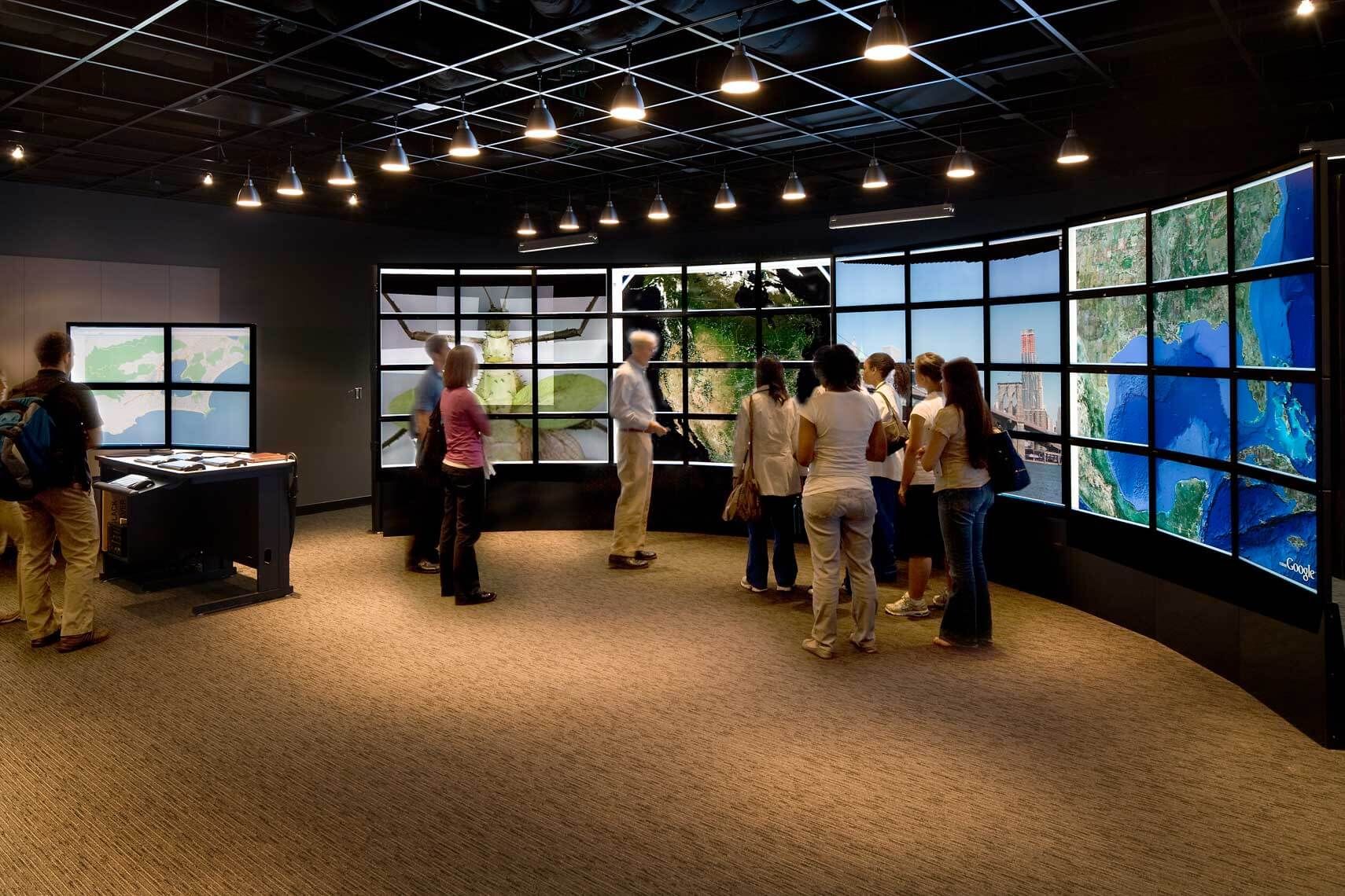 Faculty and students experience the interactive display at the Parker H. Petit Science Center at Georgia State University