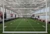 University of Georgia Indoor Athletic Facility | Daytime Interior Football Field<br>Collins Cooper Carusi Architects / Ratio / Sherman Construction Company